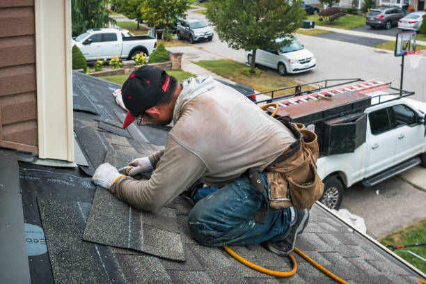 Professional Roofing technician working in Ossipee, NH